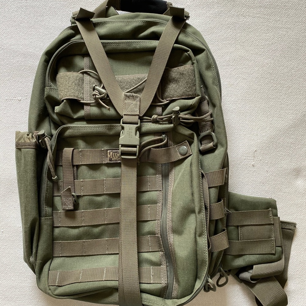 Maxpedition Left Shoulder sling pack.